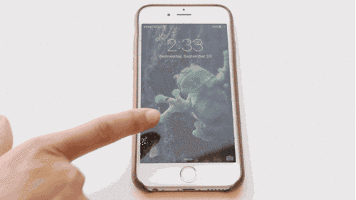 一种为静态壁纸另一种为live po动态锁屏,手拿iphone6s感觉件
